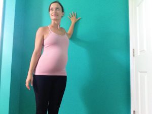 Shoulder Opener at Wall | Shoulder Yoga Stretches for Breastfeeding Moms | SpoiledYogi.com